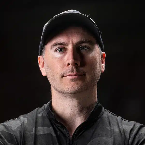 Portrait of Jeremy Tremp wearing a ball cap